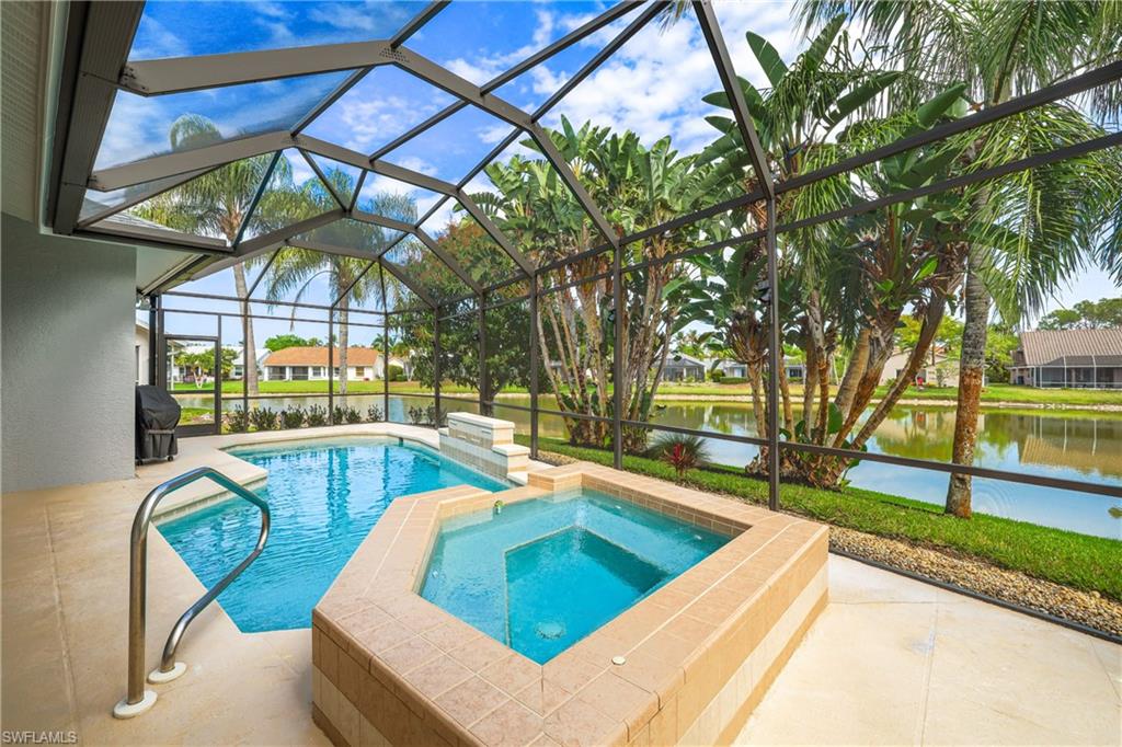 5235 Malvern Court Naples, FL 34112 - Photo 2 of 28 a view of a backyard with swimming pool