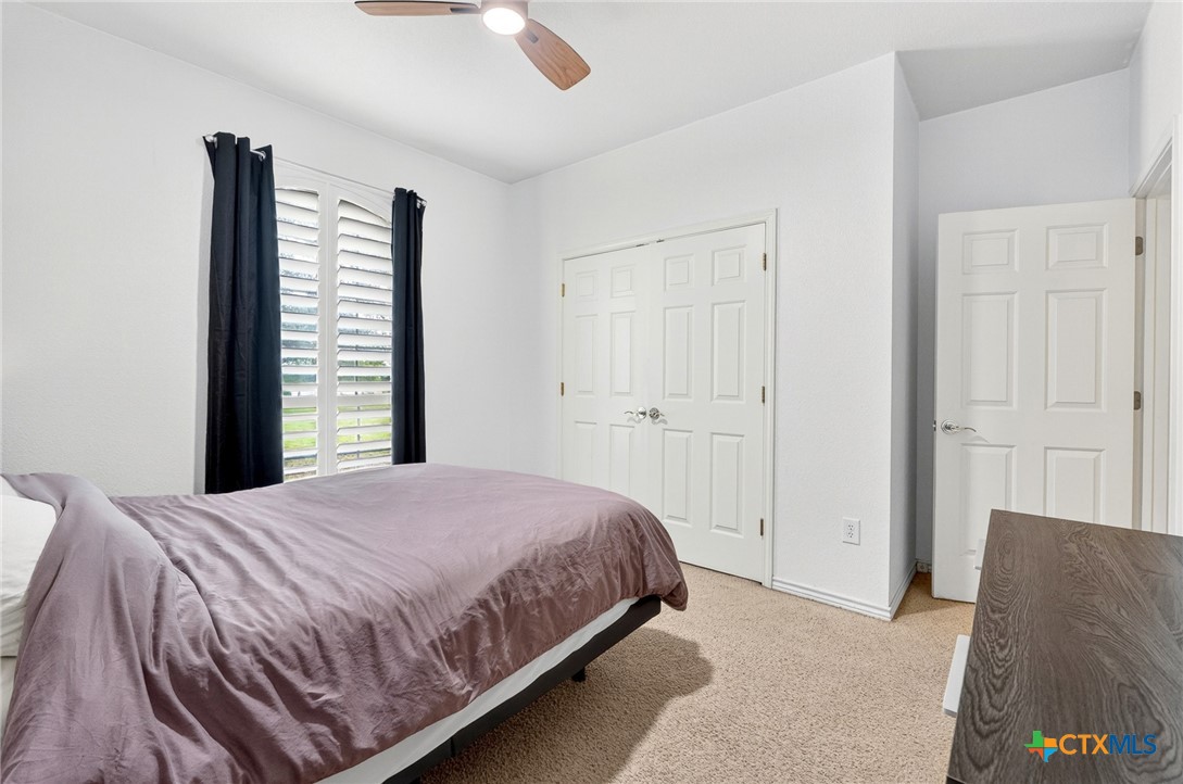 421 Sunset Ridge Drive Killeen, TX 76549 - Photo 11 of 47 a bedroom with a bed and a window
