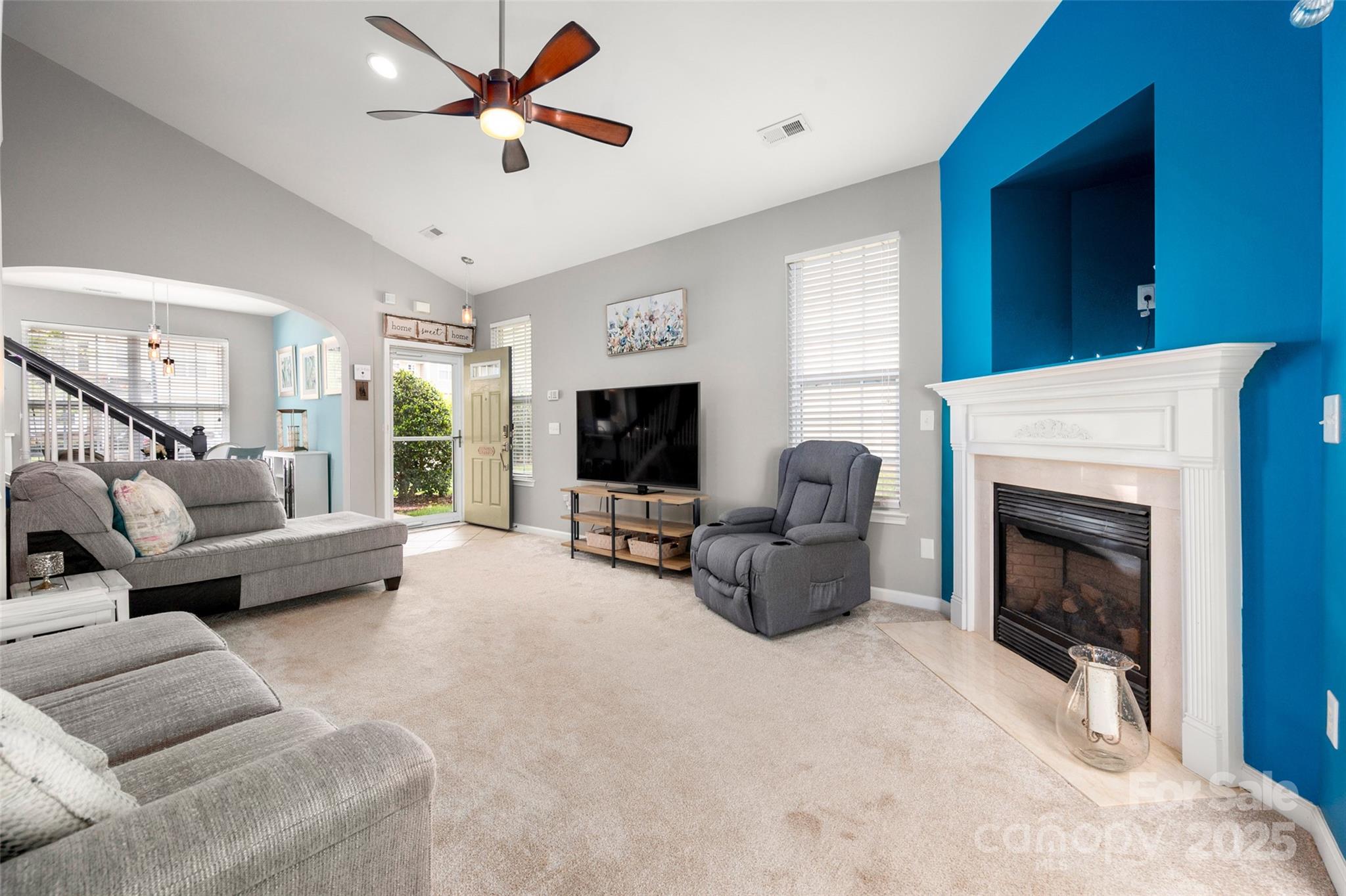 969 Copperstone Lane Fort Mill, SC 29708 - Photo 17 of 36 a living room with furniture and a fireplace