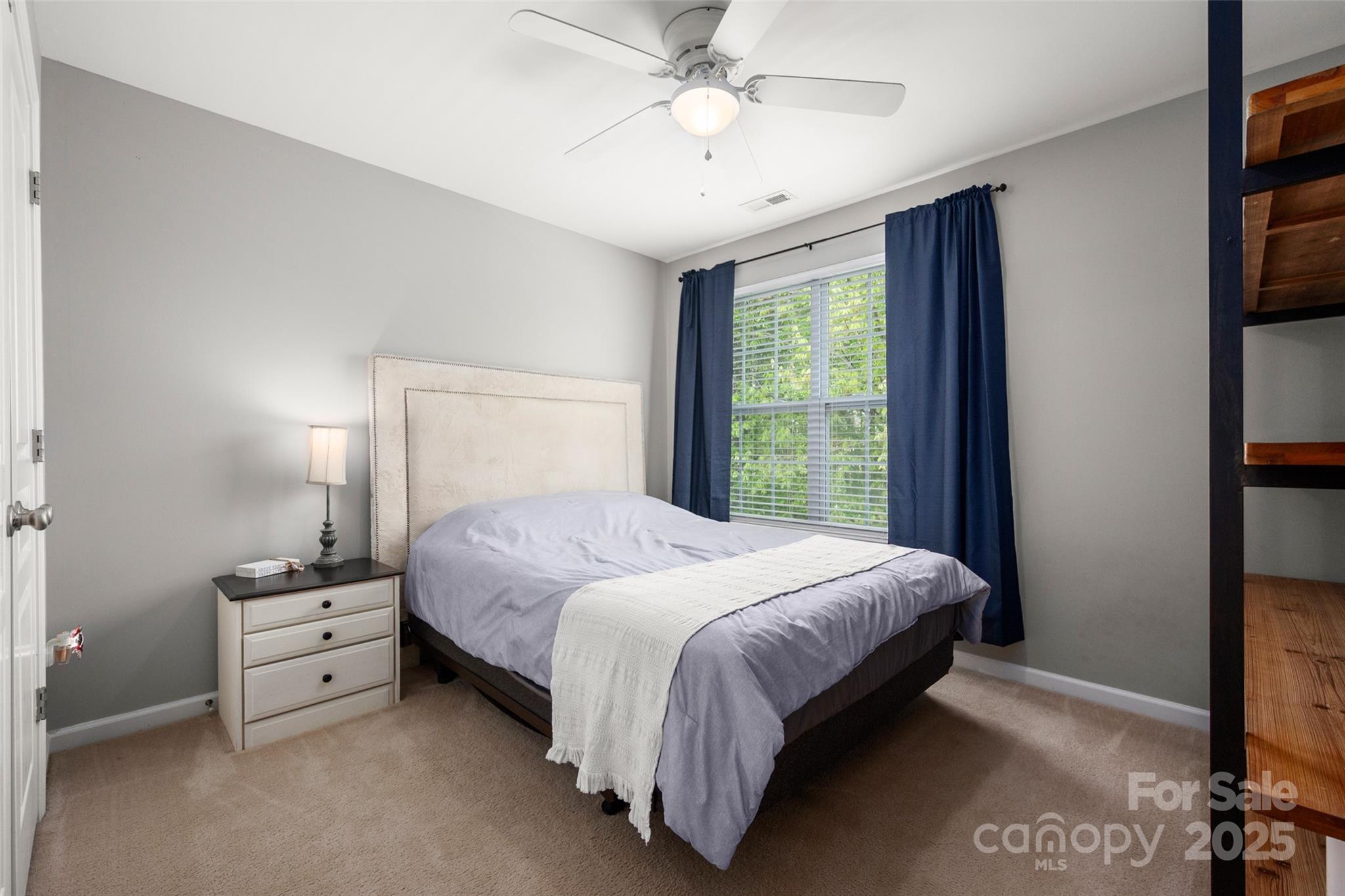 969 Copperstone Lane Fort Mill, SC 29708 - Photo 24 of 36 a bedroom with a bed and a window
