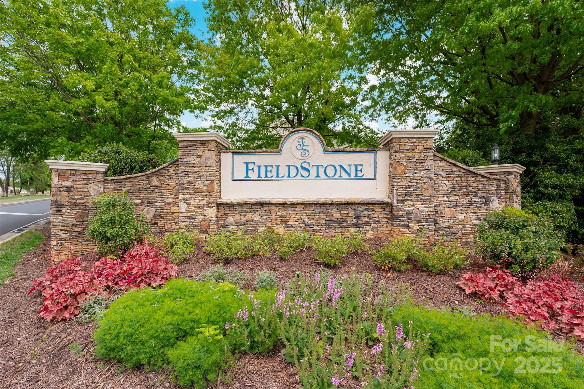 969 Copperstone Lane Fort Mill, SC 29708 - Photo 32 of 36 a sign that is sitting in a garden