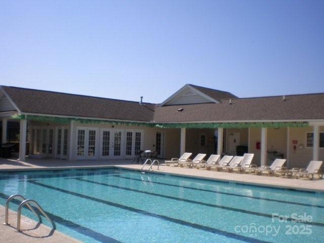 969 Copperstone Lane Fort Mill, SC 29708 - Photo 34 of 36 a view of a house with a backyard and porch
