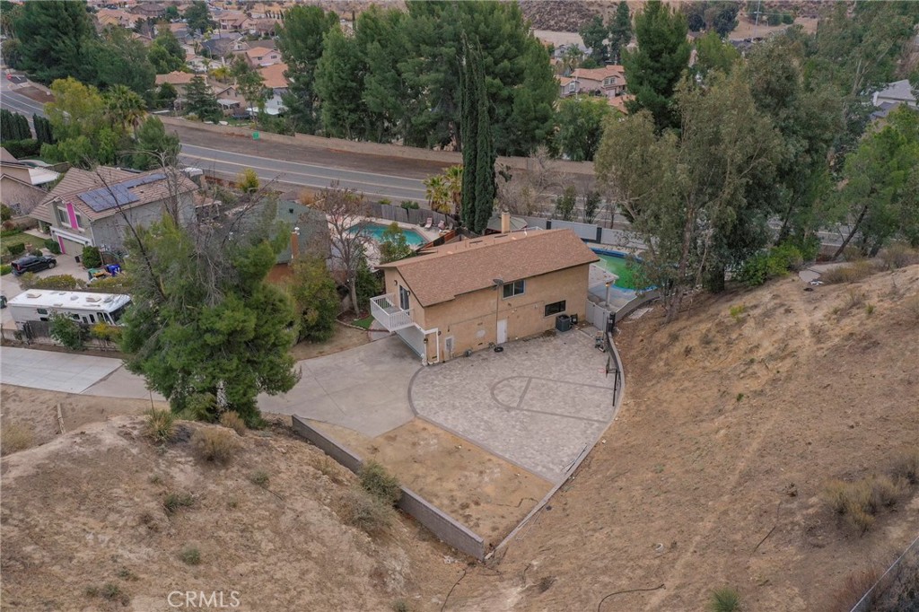 20643 Calhaven Drive Saugus, CA 91390 - Photo 2 of 6 an aerial view of a house with a yard and lake view