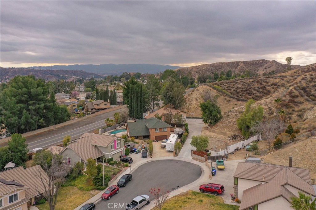 20643 Calhaven Drive Saugus, CA 91390 - Photo 4 of 6 an aerial view of a city with lots of residential buildings