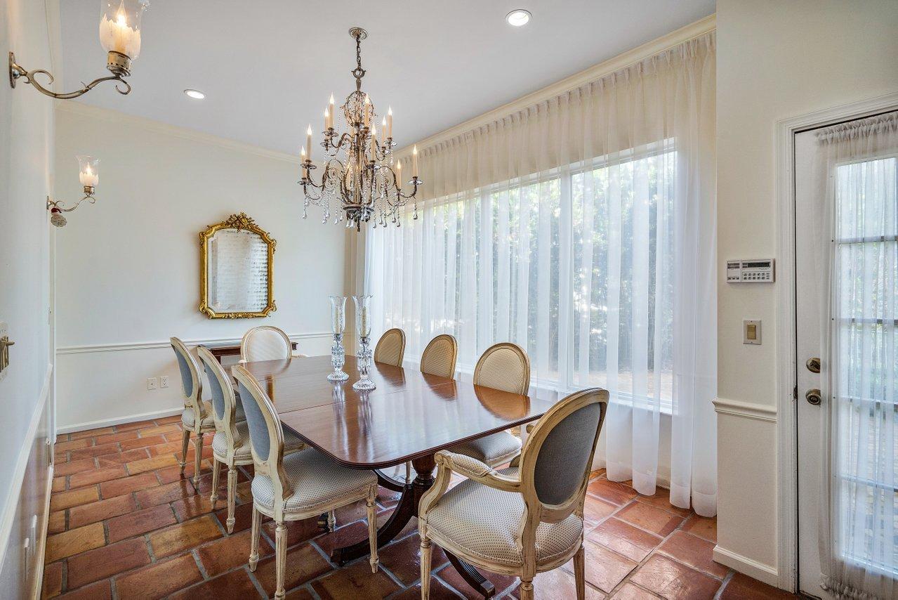 169 Apollo Circle Jupiter, FL 33477 - Photo 14 of 54 a view of a dining room with furniture and chandelier