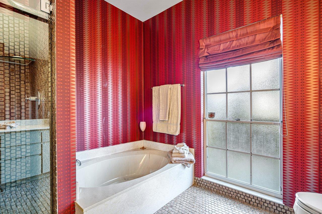 169 Apollo Circle Jupiter, FL 33477 - Photo 20 of 54 a bedroom with a bed and a window