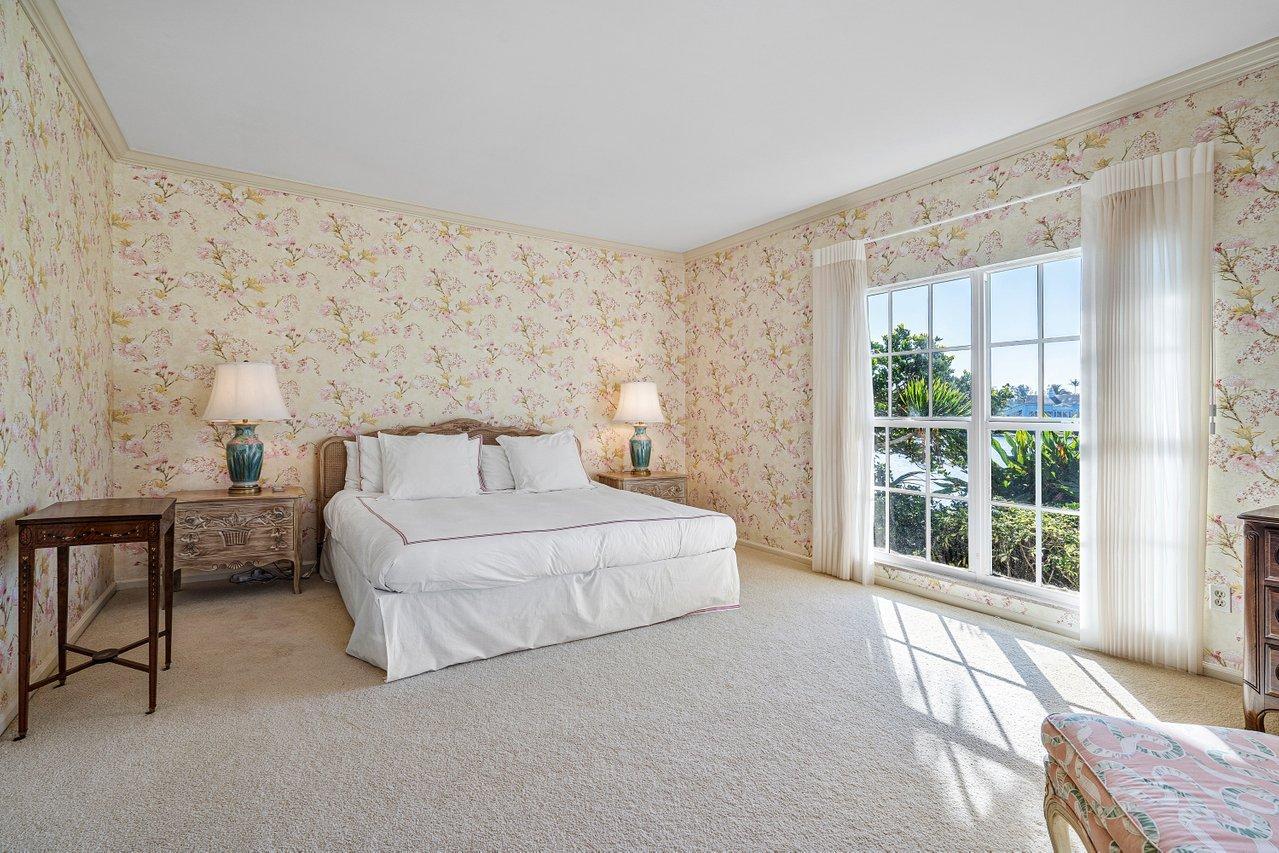 169 Apollo Circle Jupiter, FL 33477 - Photo 28 of 54 a bedroom with a bed and a window
