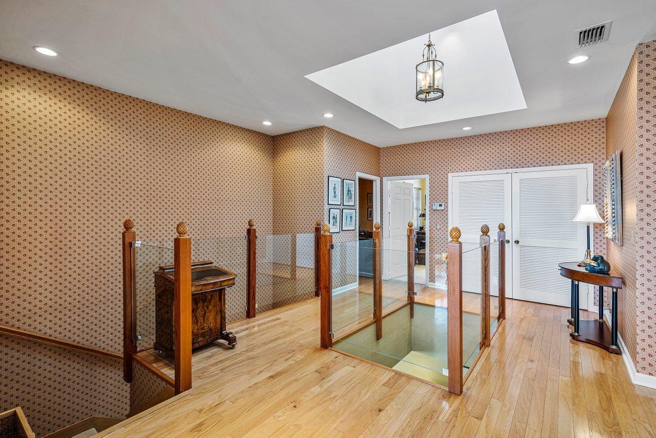 169 Apollo Circle Jupiter, FL 33477 - Photo 34 of 54 a view of a room with wooden floor