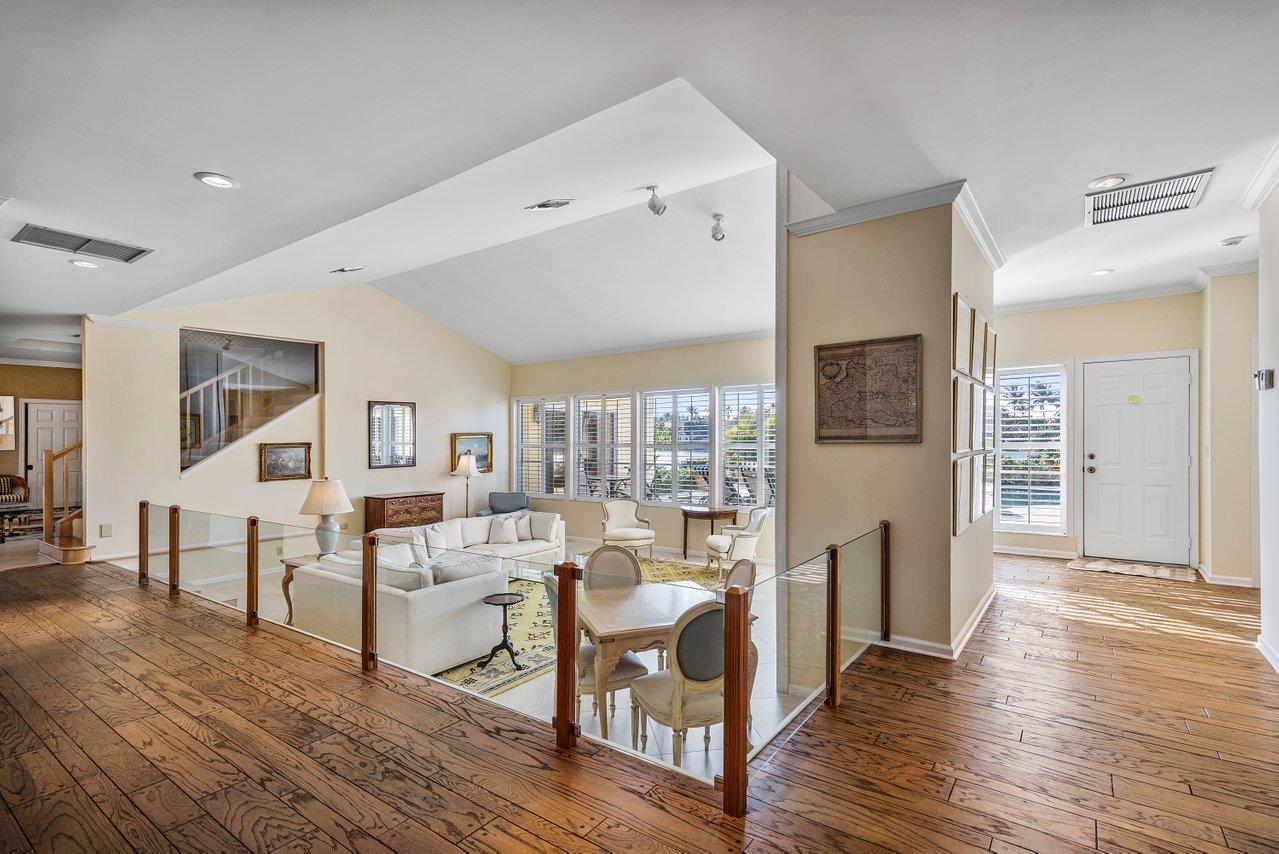 169 Apollo Circle Jupiter, FL 33477 - Photo 5 of 54 a living room with furniture and wooden floor