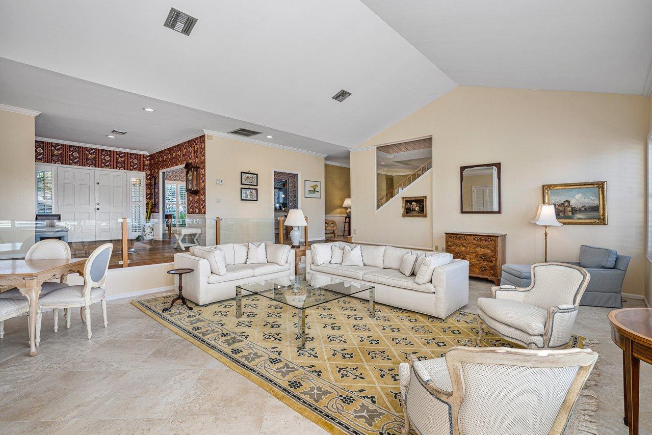 169 Apollo Circle Jupiter, FL 33477 - Photo 9 of 54 a living room with furniture and a large window