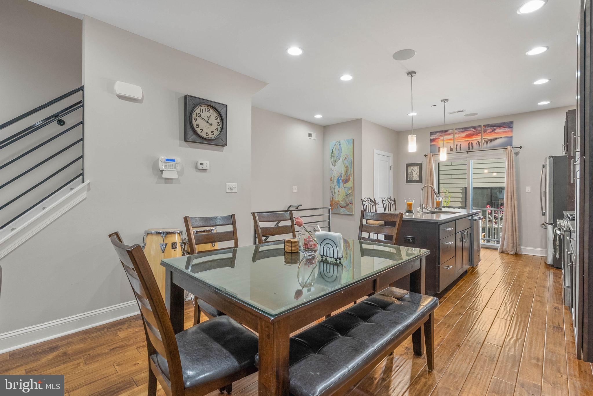 1423 South Howard Street Philadelphia, PA 19147 - Photo 18 of 40 a dining room with furniture and wooden floor