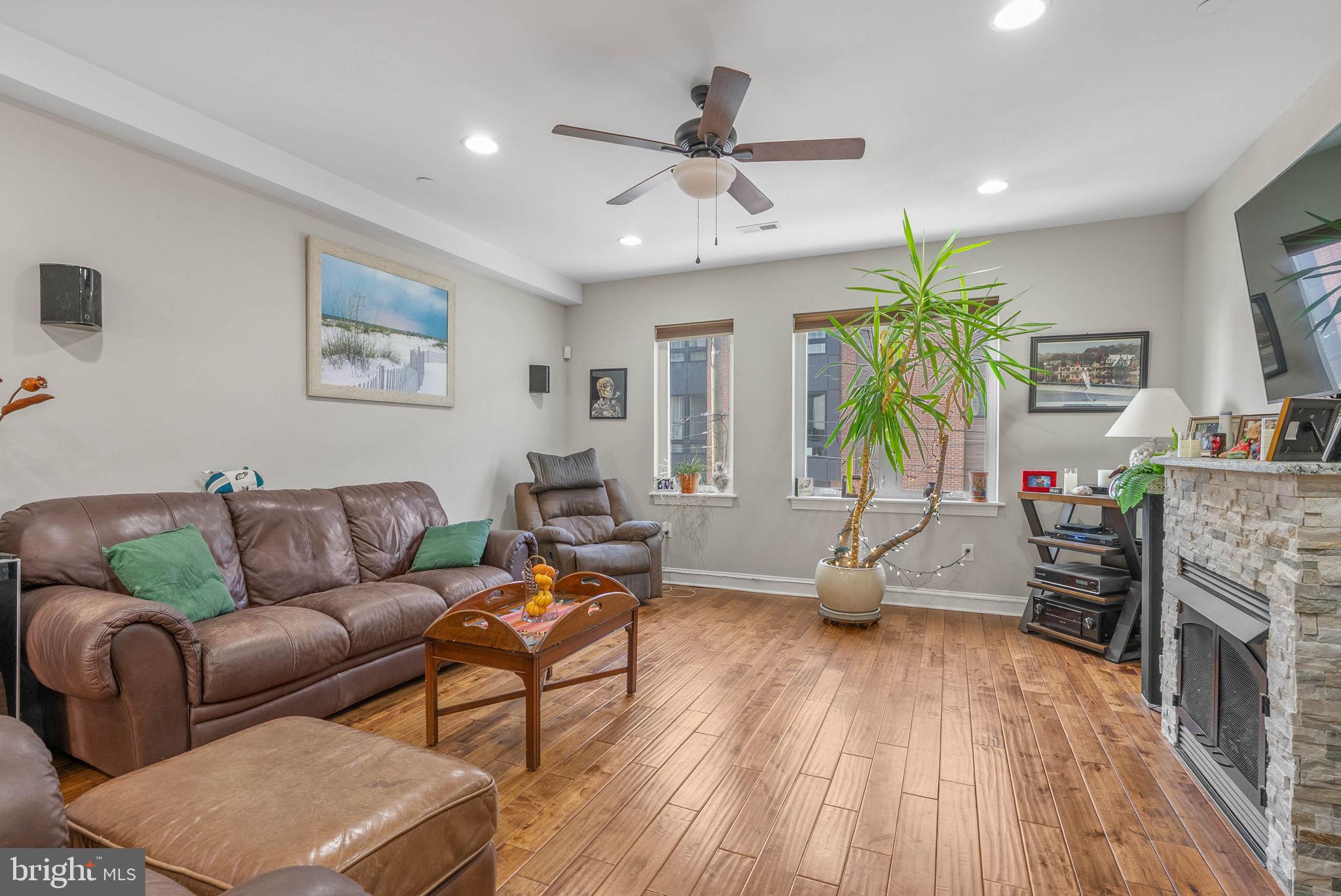 1423 South Howard Street Philadelphia, PA 19147 - Photo 19 of 40 a living room with furniture and a wooden floor