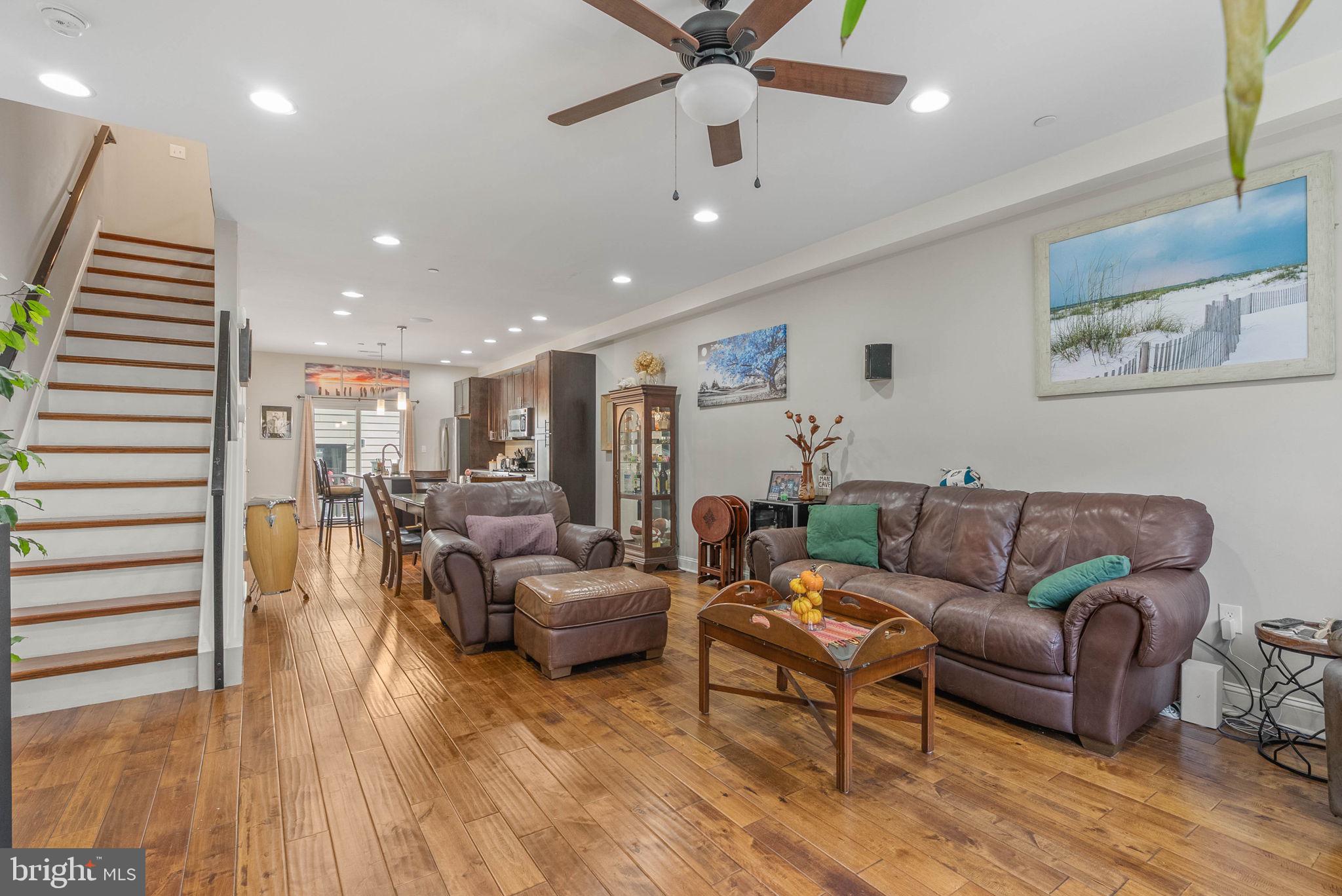 1423 South Howard Street Philadelphia, PA 19147 - Photo 21 of 40 a living room with furniture and a wooden floor