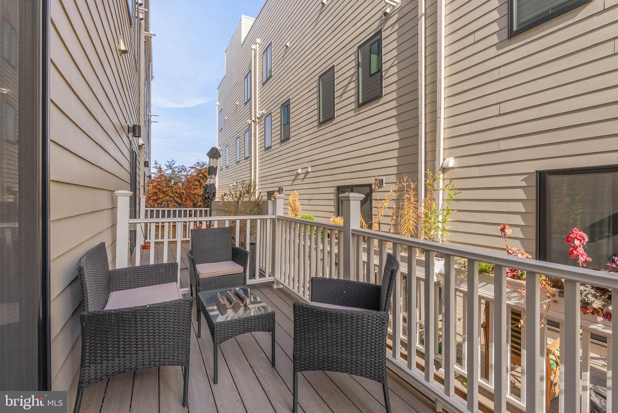 1423 South Howard Street Philadelphia, PA 19147 - Photo 22 of 40 a view of a chair on the roof deck