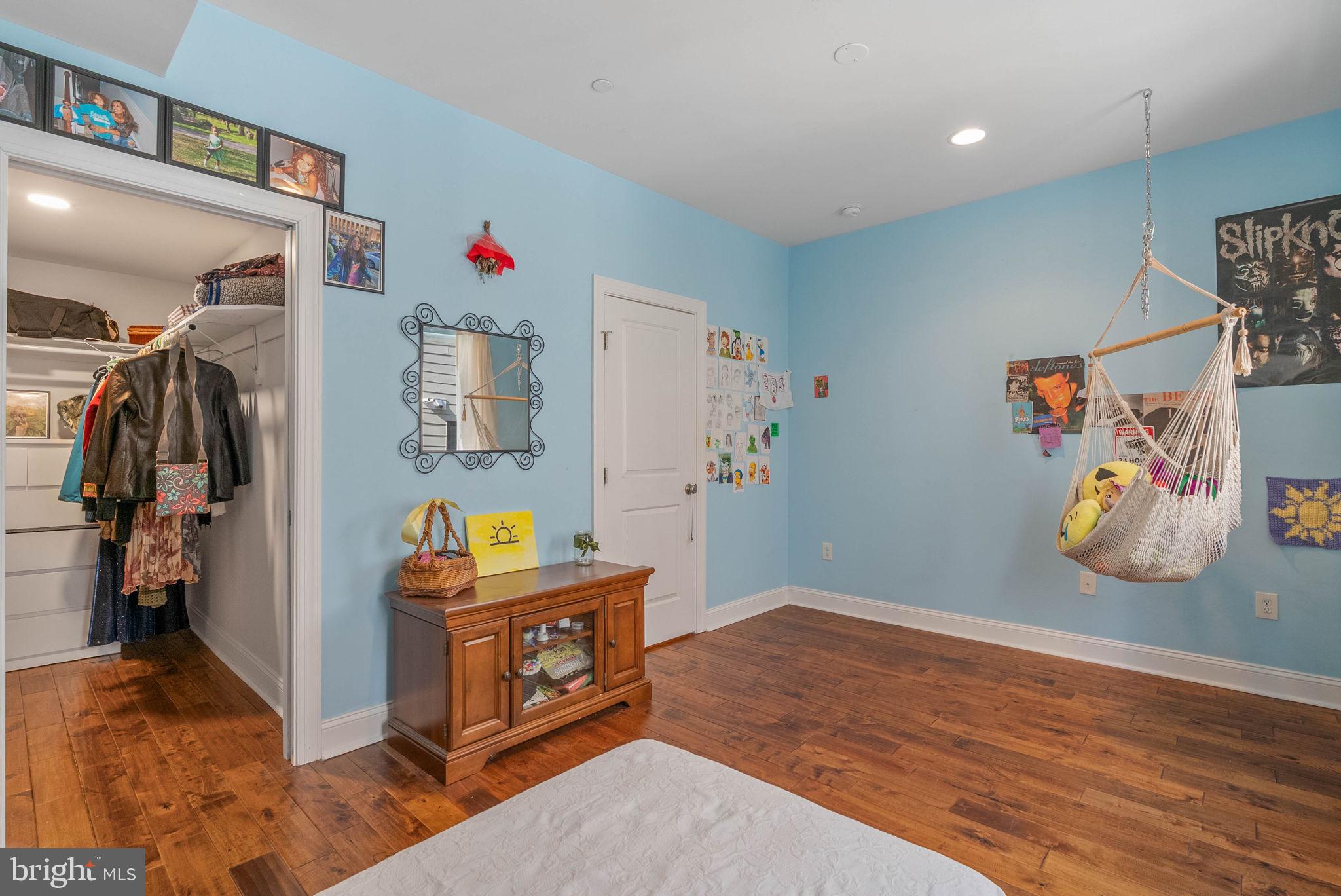 1423 South Howard Street Philadelphia, PA 19147 - Photo 25 of 40 a living room with furniture and gym equipment