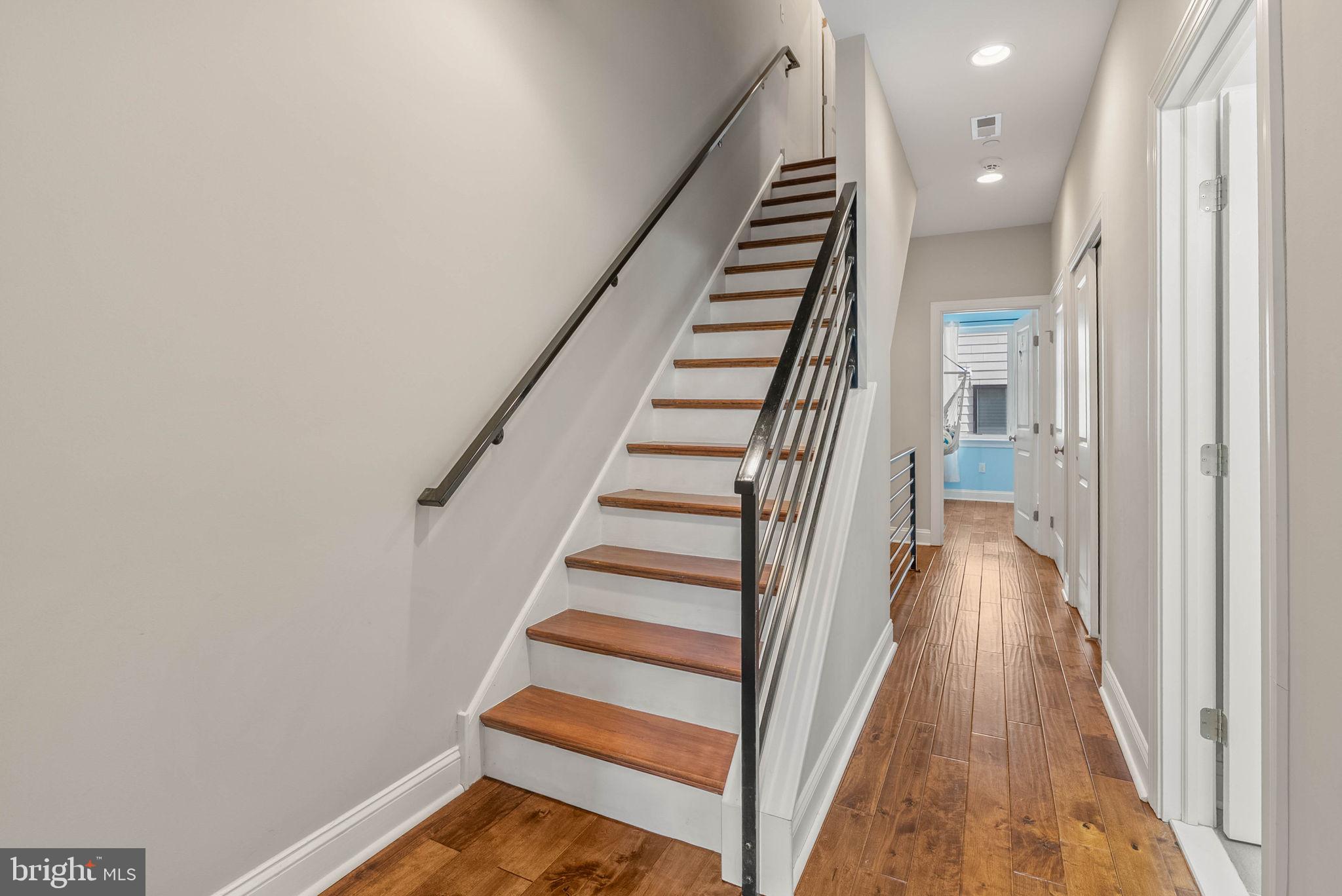1423 South Howard Street Philadelphia, PA 19147 - Photo 30 of 40 a view of a hallway with wooden floor and entryway