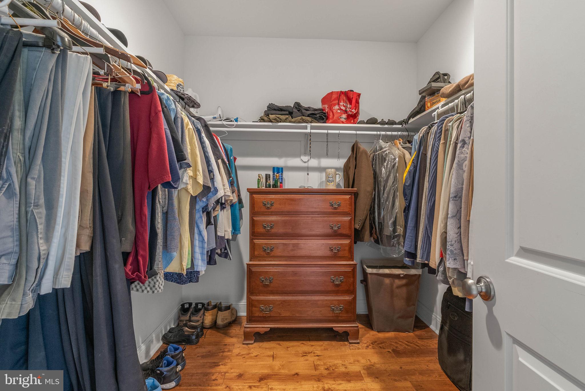 1423 South Howard Street Philadelphia, PA 19147 - Photo 34 of 40 a view of walk in closet with clothes and shoes