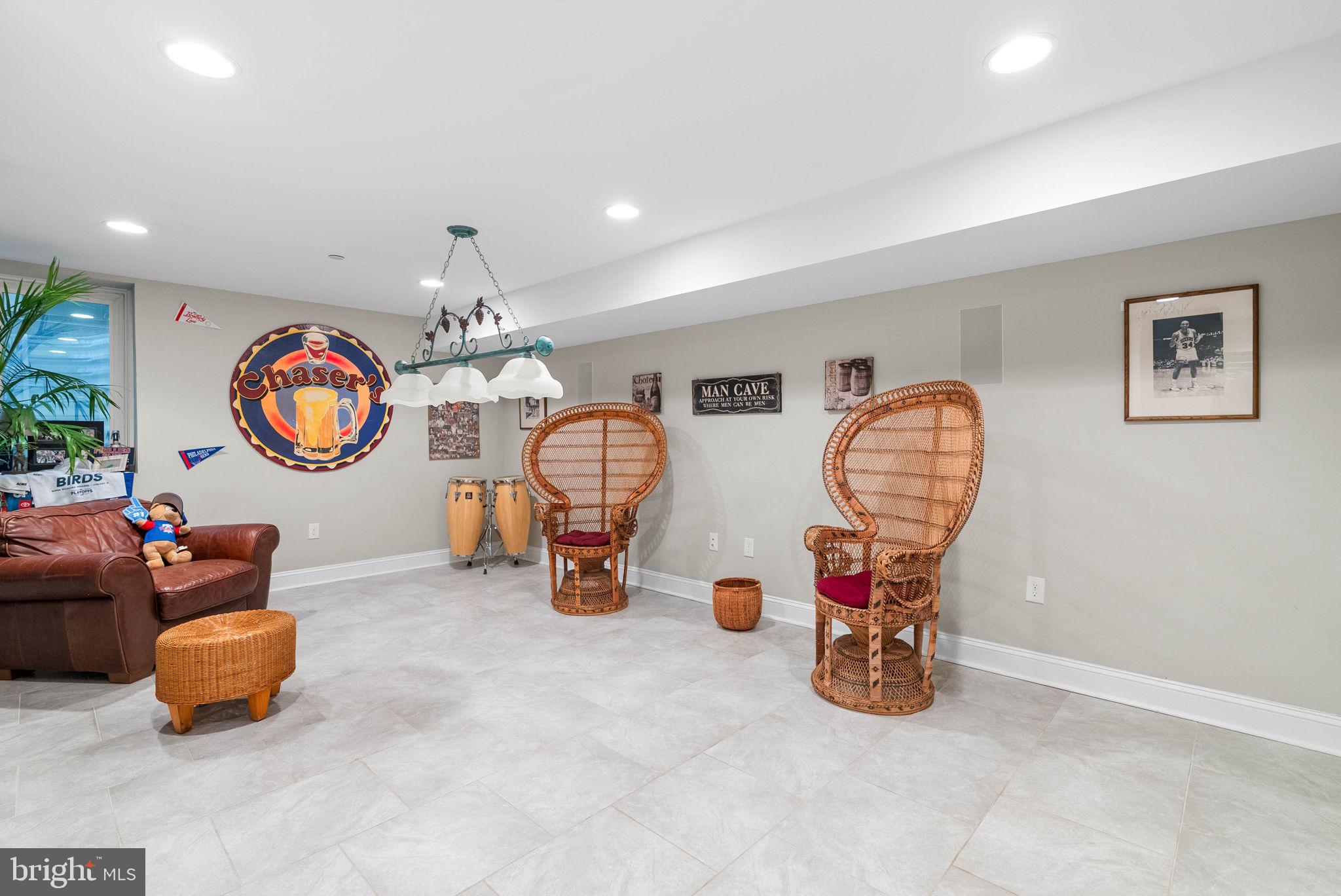 1423 South Howard Street Philadelphia, PA 19147 - Photo 9 of 40 a view of living room filled with furniture and a chandelier