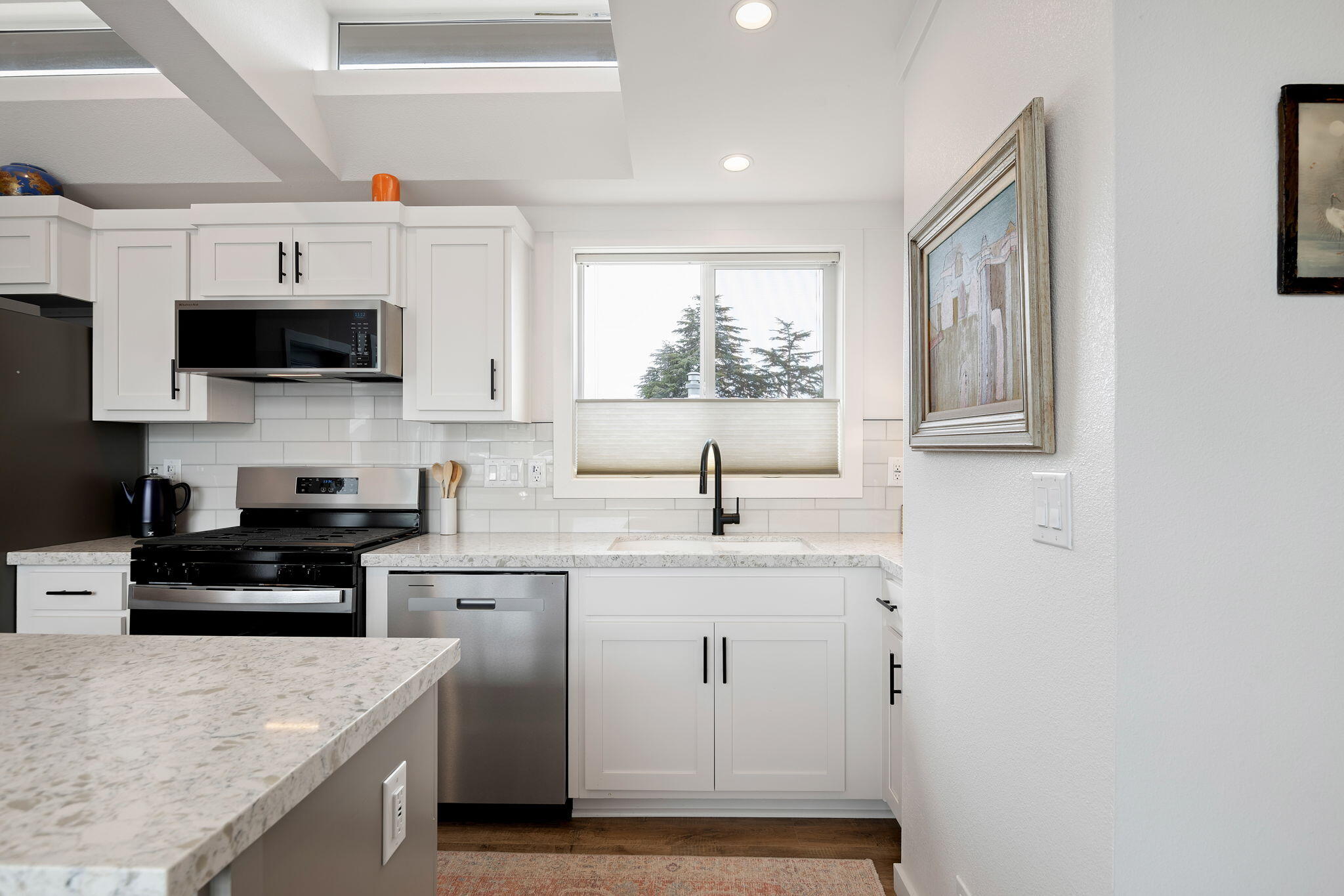 333 Old Mill Road, Unit SPC 79 Santa Barbara, CA 93110 - Photo 9 of 30 a kitchen with a sink a microwave and cabinets
