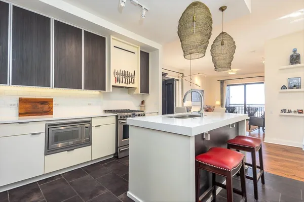 a bathroom with a bathtub and shower