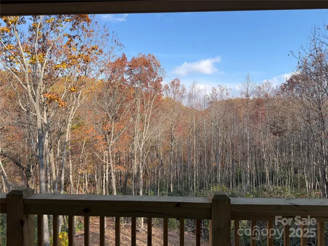 a view of a balcony with an outdoor space