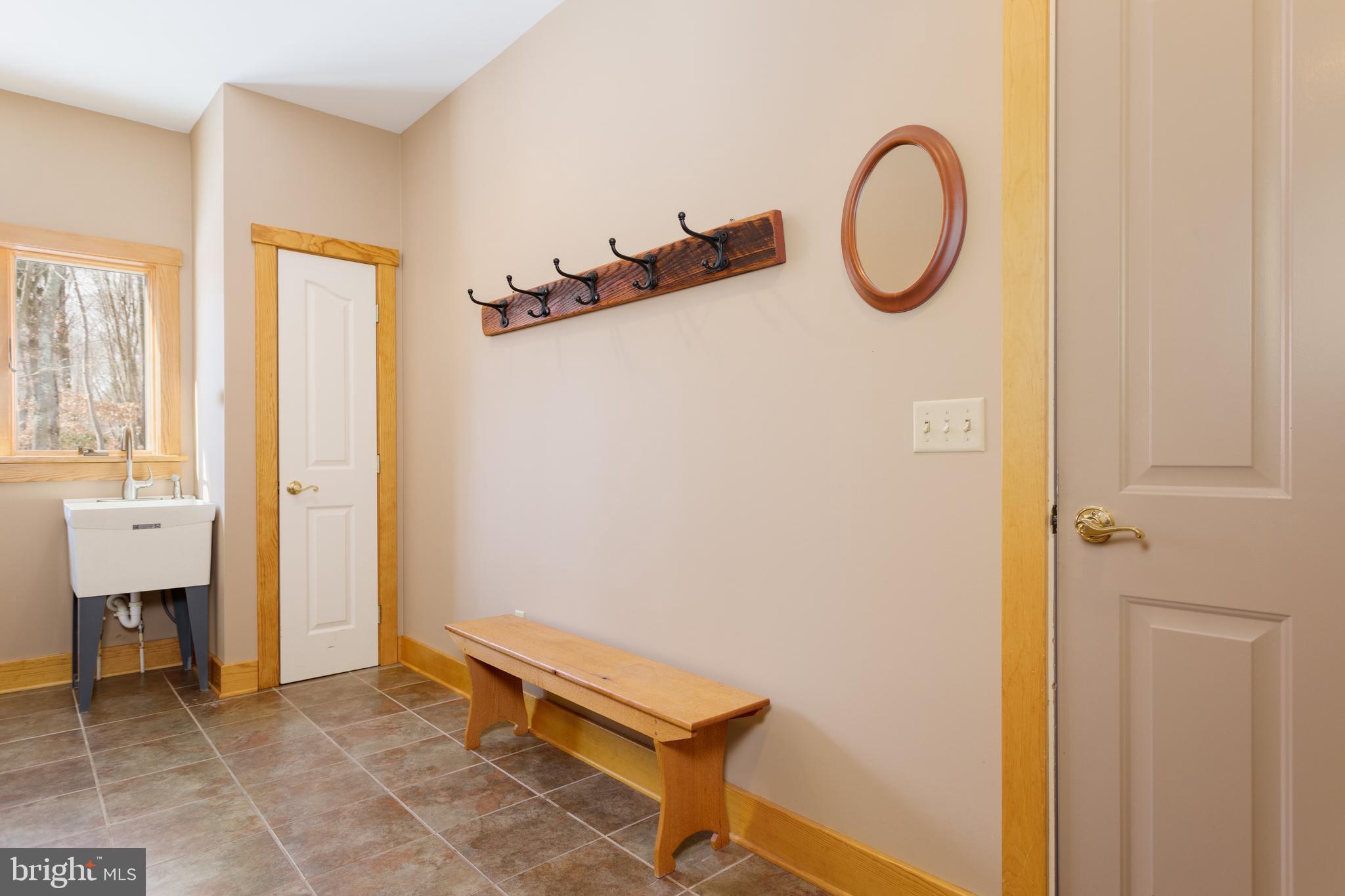 2502 Singerly Road Elkton, MD 21921 - Photo 14 of 29 Mud room with utility sink & access to powder room