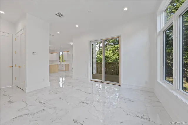 a view of a wooden balcony with wooden floor