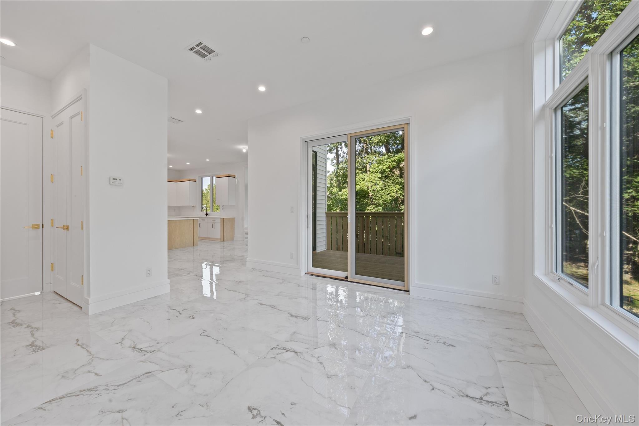 40 Singer Avenue, Unit 214 Spring Valley, NY 10977 - Photo 12 of 49 a view of an empty room with a window