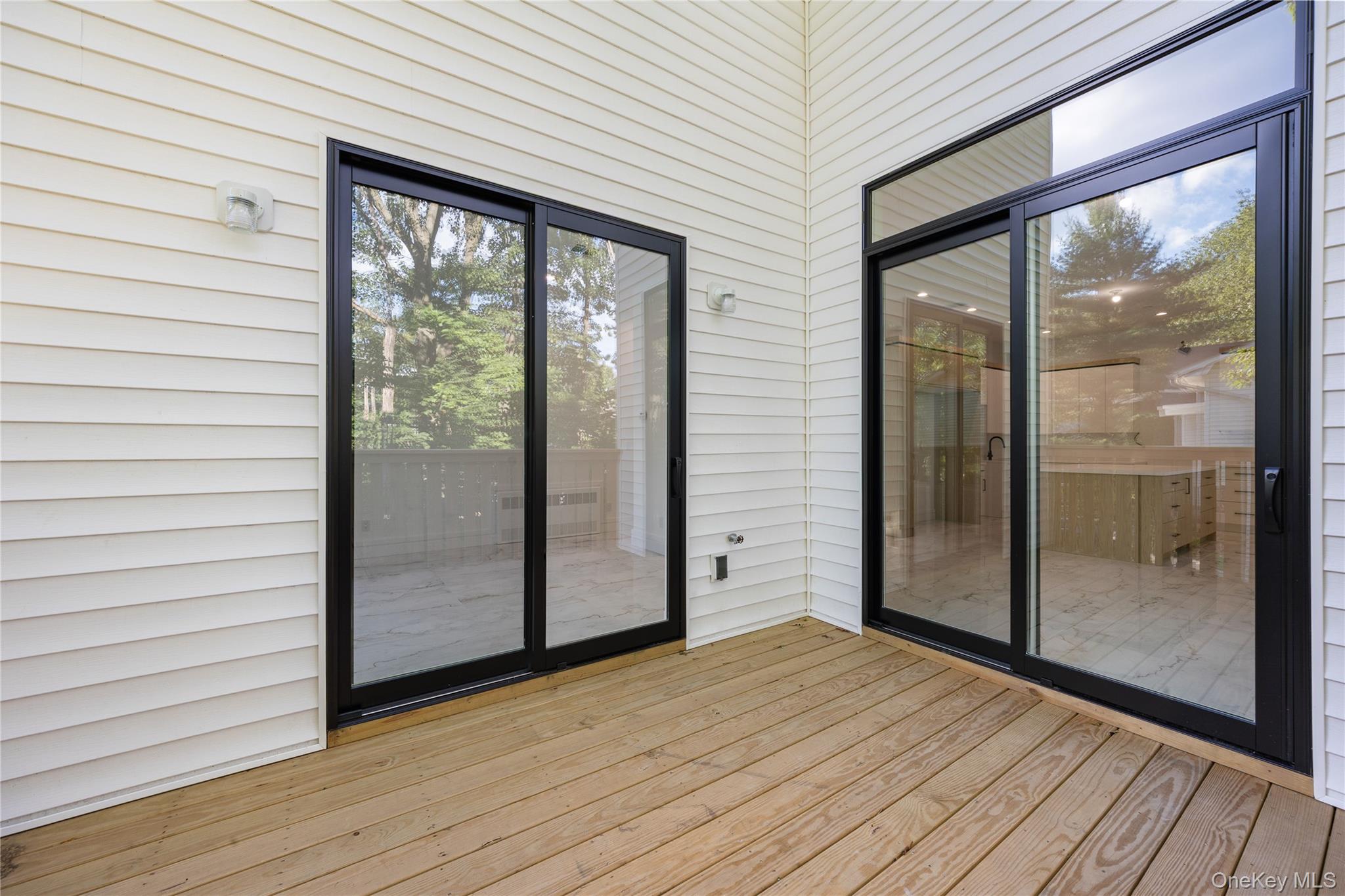 40 Singer Avenue, Unit 214 Spring Valley, NY 10977 - Photo 16 of 49 a view of front door and wooden floor