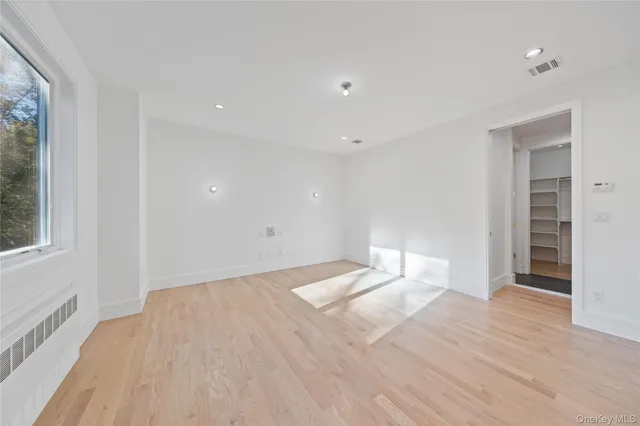 a white bath tub sitting in a bathroom
