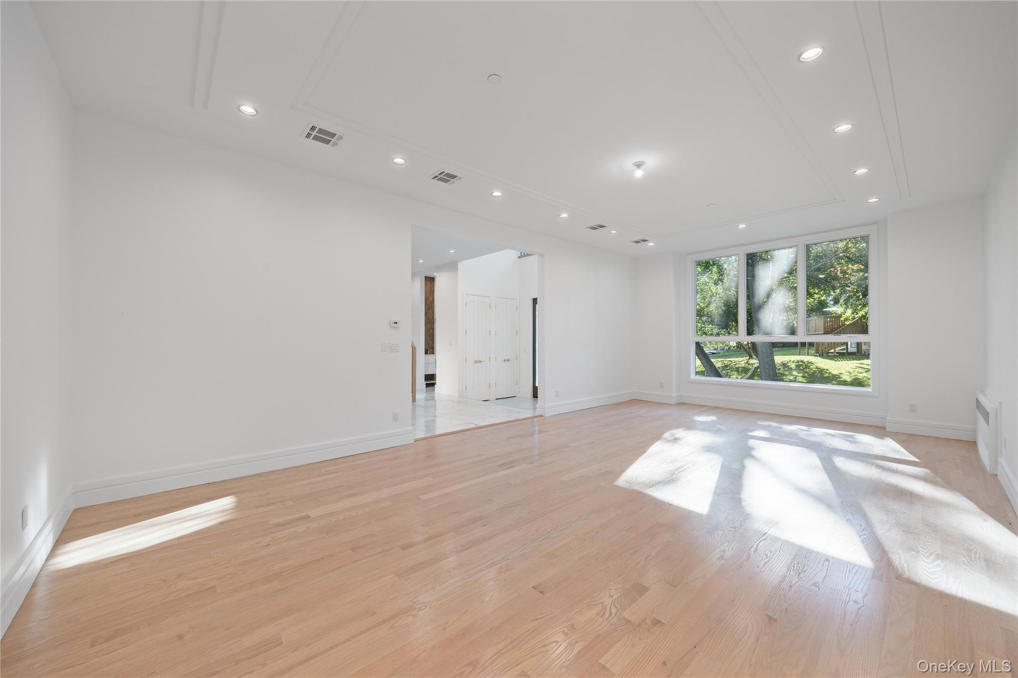 40 Singer Avenue, Unit 214 Spring Valley, NY 10977 - Photo 5 of 49 a view of an empty room with a window