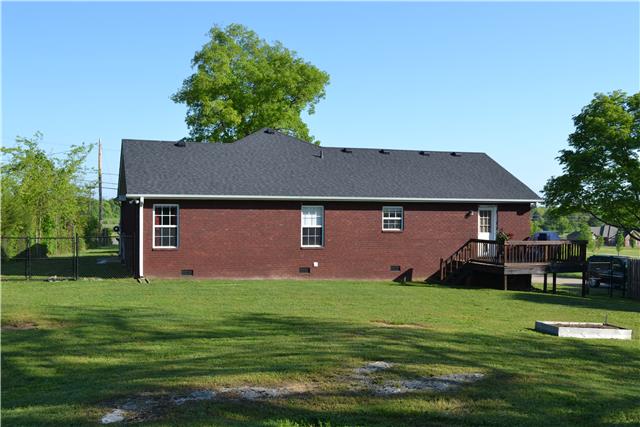 477 Rome Pike Lebanon, TN 37087 - Photo 13 of 14 All brick home with deck and fenced yard. Gates open on both sides of the house. One side has a double gate.