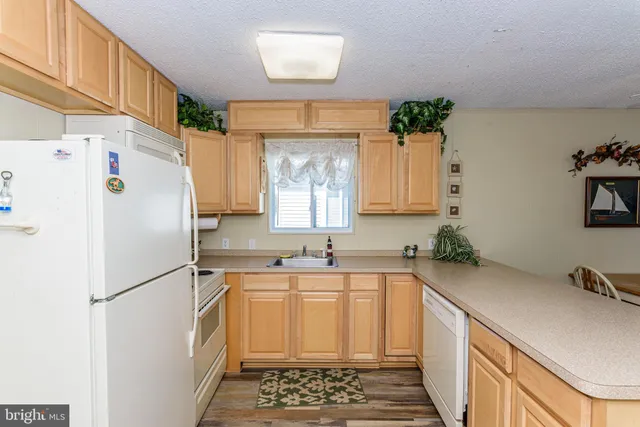 $345,000 | 128 Captains Quarters Road, Unit 201, Ocean City, MD 21842