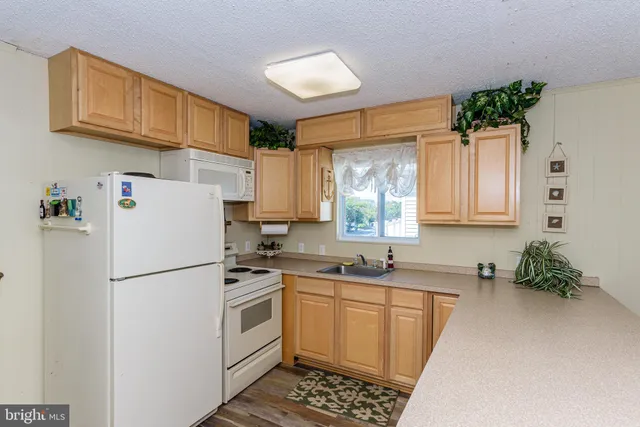 $345,000 | 128 Captains Quarters Road, Unit 201, Ocean City, MD 21842