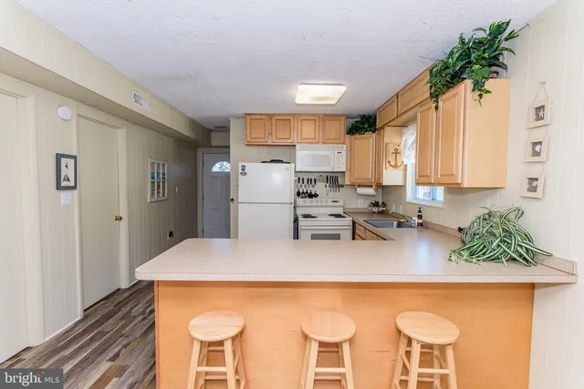 $345,000 | 128 Captains Quarters Road, Unit 201, Ocean City, MD 21842