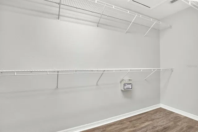 a view of a room with racks on the wall