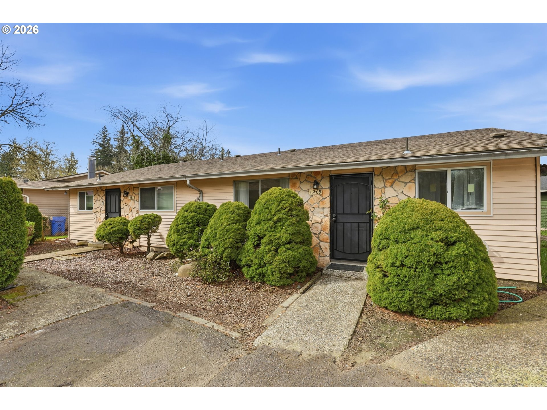 1267 Northeast 183rd Avenue Portland, OR 97230 - Photo 1 of 34 a view of a house with a patio