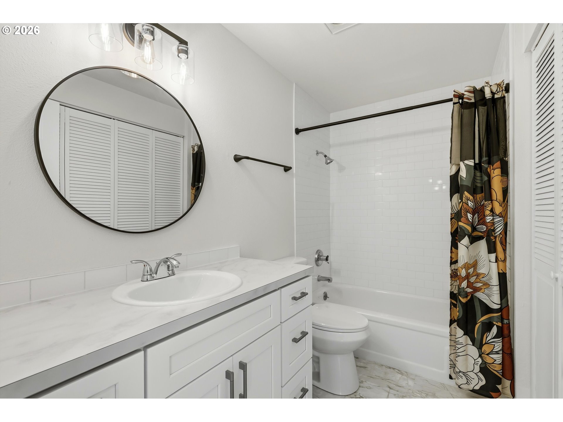 1267 Northeast 183rd Avenue Portland, OR 97230 - Photo 16 of 34 a bathroom with a sink toilet and shower