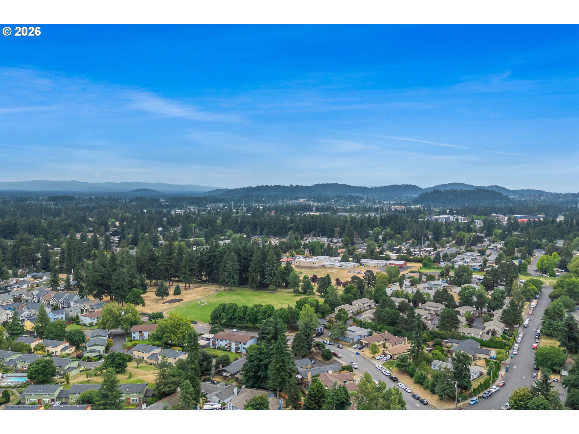 1267 Northeast 183rd Avenue Portland, OR 97230 - Photo 26 of 34 a view of a city with mountain