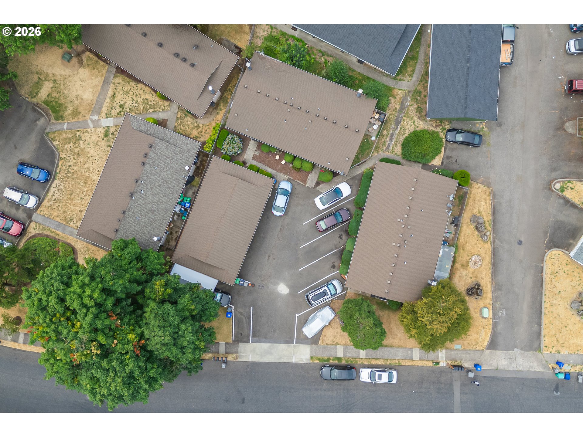 1267 Northeast 183rd Avenue Portland, OR 97230 - Photo 32 of 34 an aerial view of a house with a yard and table and chairs