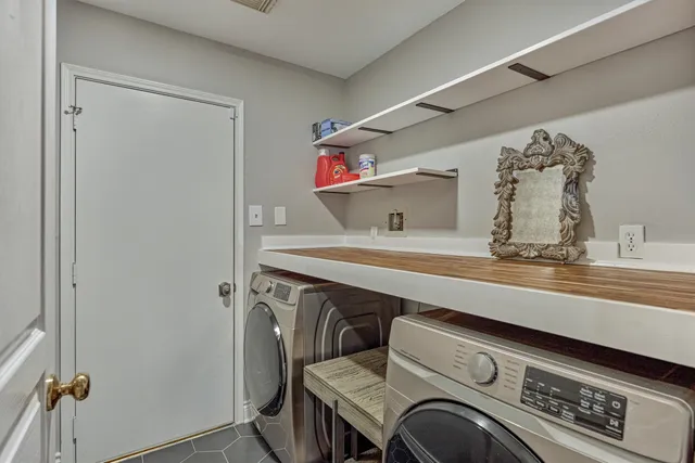 a utility room with dryer and washer