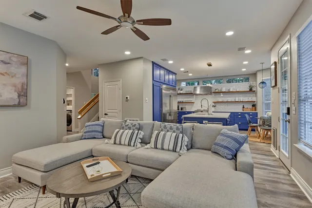 a living room with furniture and a view