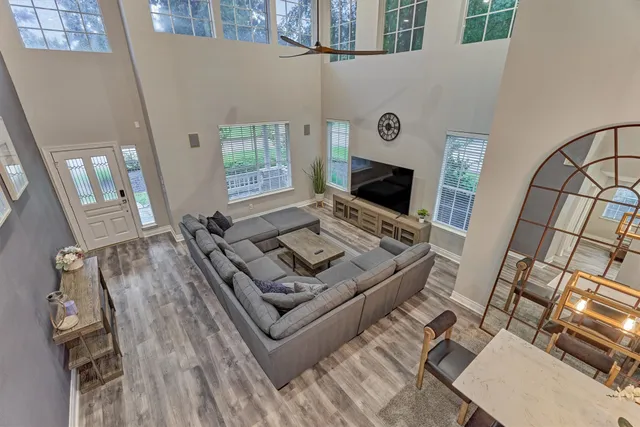 a living room with furniture and a fireplace