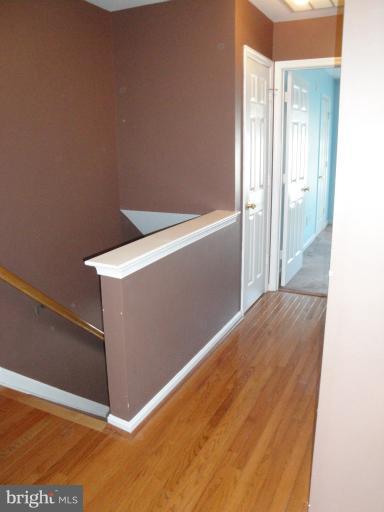 4011 Cutty Sark Road Middle River, MD 21220 - Photo 29 of 30 Upper 2nd level Hallway w/Hardwood Flooring