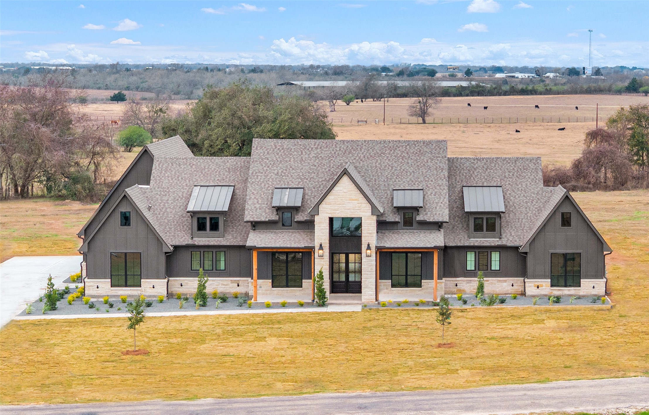 a front view of a house with swimming pool