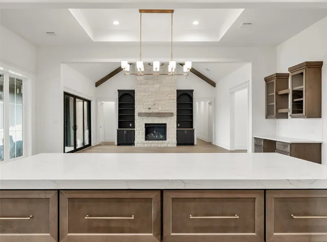 a kitchen with a stove and a refrigerator