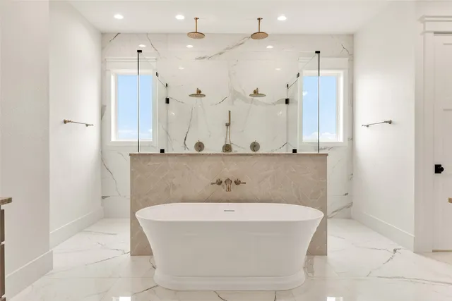 a bathroom with a bathtub and a sink