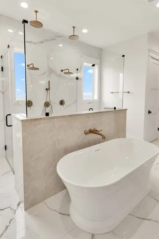 a view of a bathtub in a bathroom