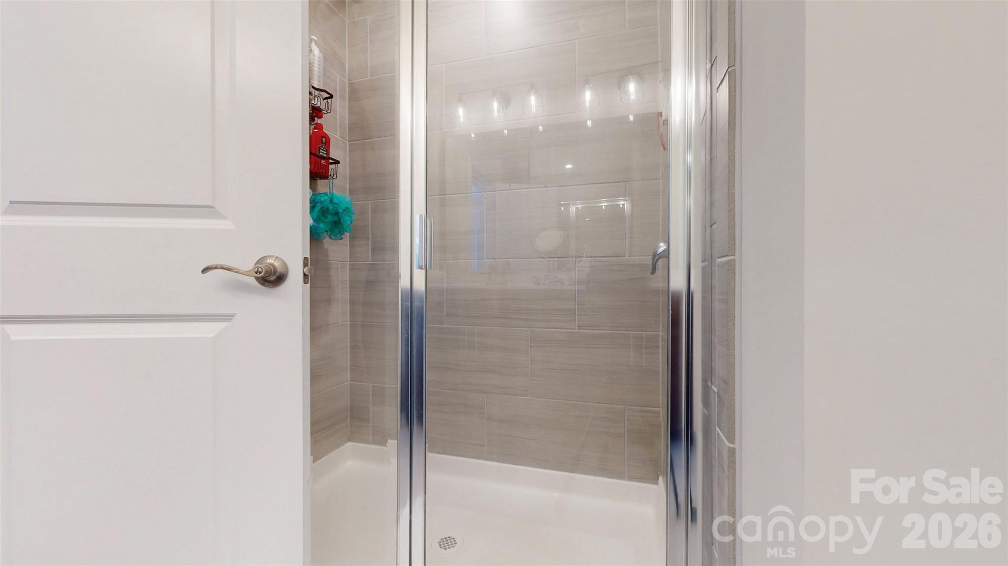 827 Canoe Song Road Fort Mill, SC 29708 - Photo 26 of 33 a bathroom with a shower