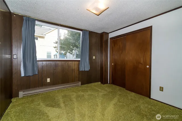 a bathroom with a tub and shower